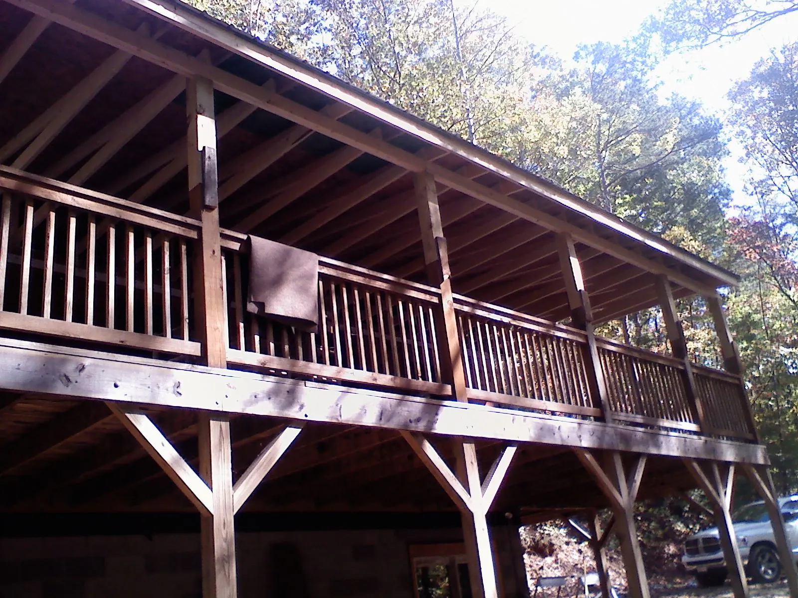 Timber framing under a new elevated porch and deck — Roof Leak Repair in Sugar Land by Roofing Brothers